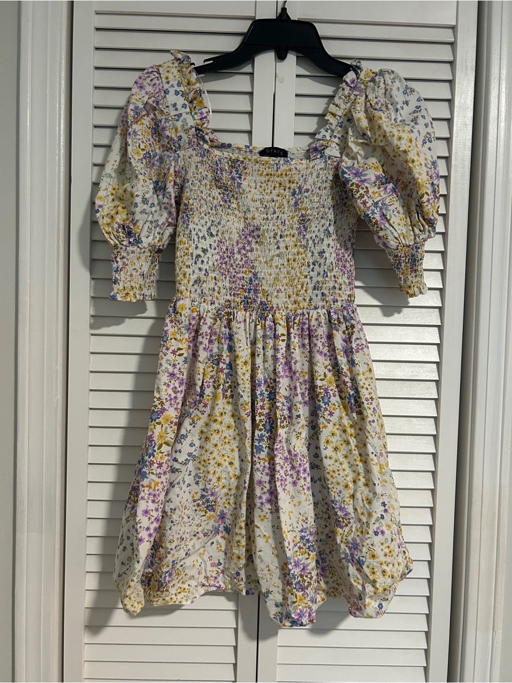 1. State White Smocked Mini Dress with Yellow & Purple Floral